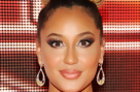 Adrienne Bailon Covers Rolling Out Magazine