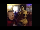 Sexy Asian lady dancing with big head baby